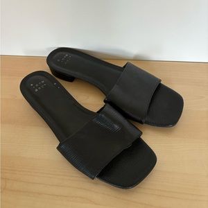 Black slip low heel sandal